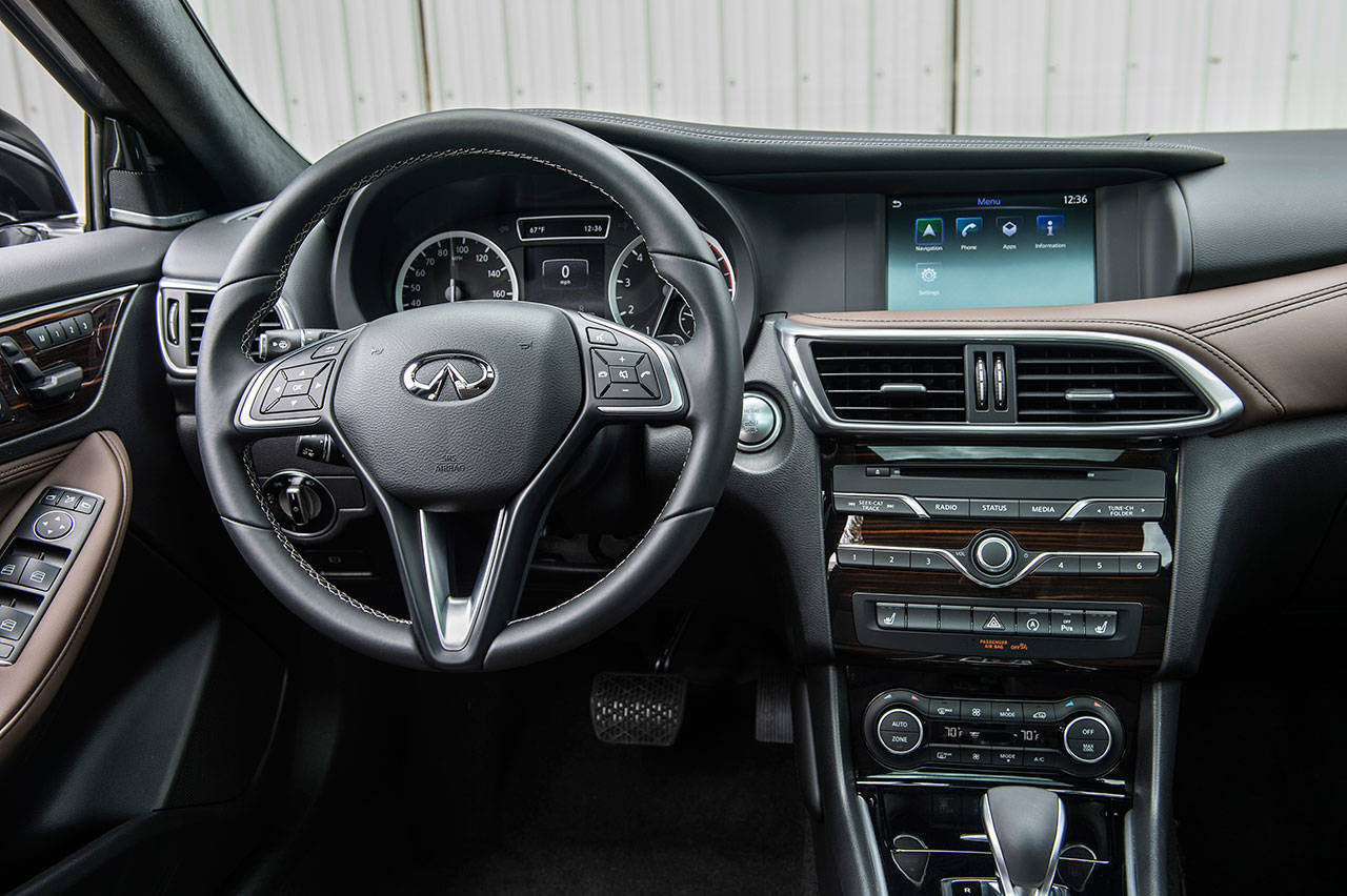 The Infiniti QX30’s InTouch infotainment and connectivity system is easy to use, and climate system controls are well placed. (Manufacturer photo)