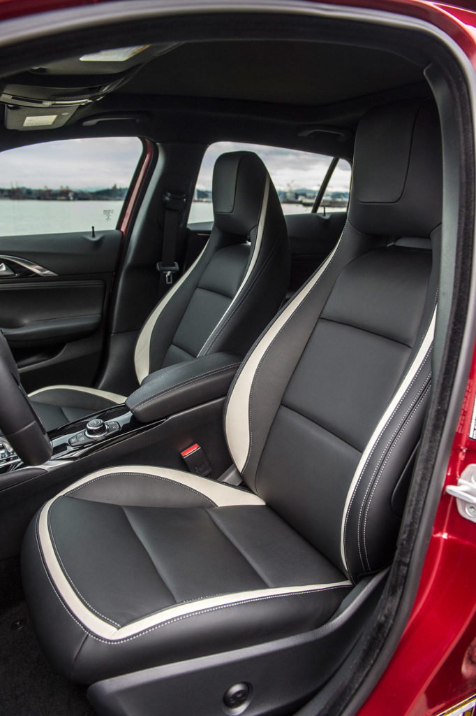 Boldly styled sport front seats with integrated headrests are a standard feature of the Infiniti QX30 Sport model. (Manufacturer photo)
