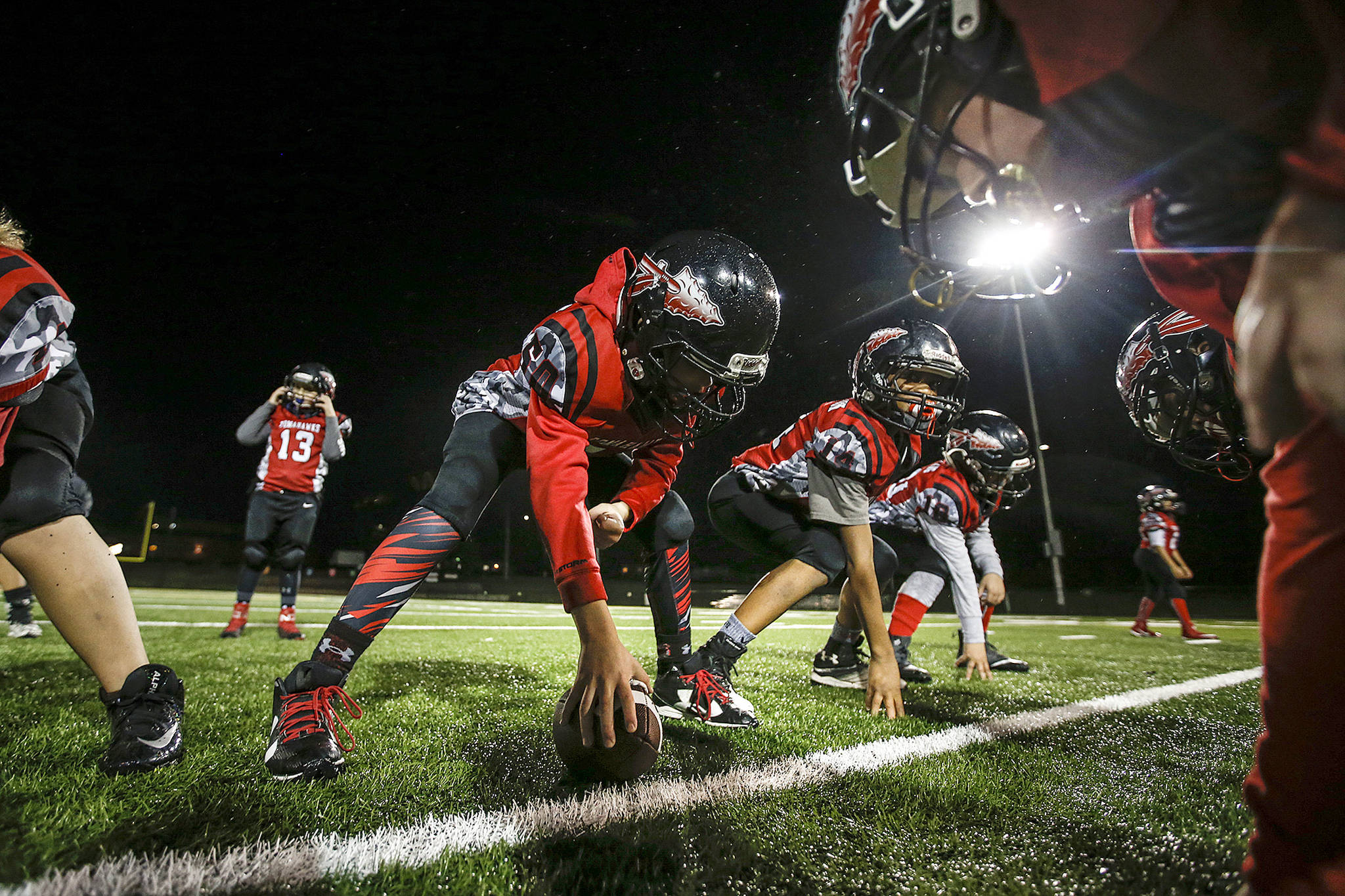 The Marysville Pilchuck Tomahawk Red 89ers practice at Tulalip Recreation Center on Tuesday, Nov. 21 in Marysville. The team, comprised of 9-year-olds, will will compete in the regional round of a national tournament this weekend in Santa Rosa, California. (Ian Terry / The Herald)