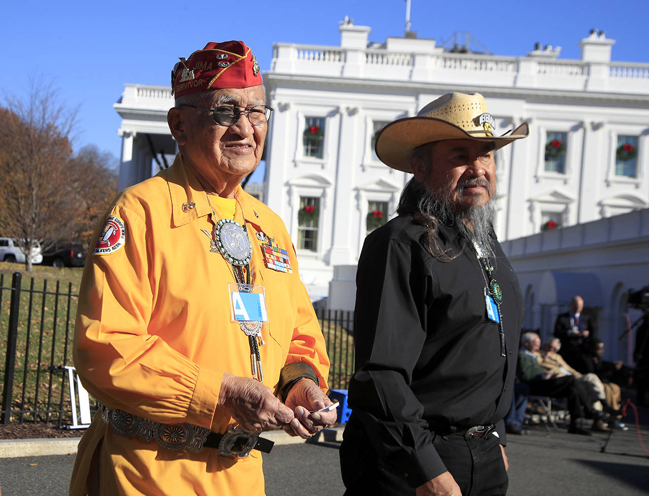 Navajo Code Talker Thomas Begay (left) and retired U.S. Army Col. Ronald Begay tour the White House in Washington on Monday. The Native American Code Talkers were honored at the White House during an event hosted by President Donald Trump. (AP Photo/Manuel Balce Ceneta)