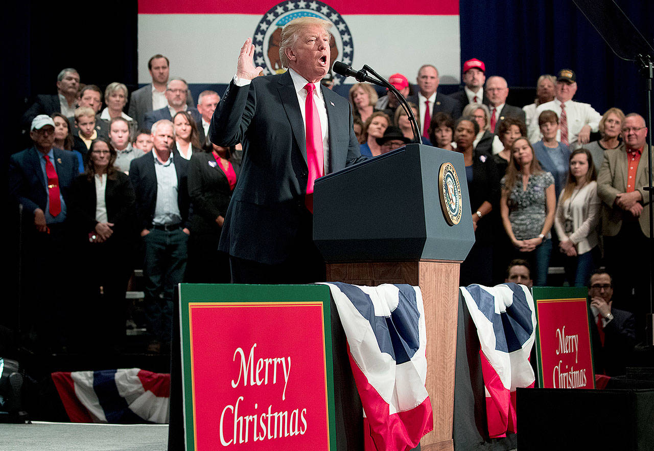 President Donald Trump speaks at a tax reform rally in St. Charles, Missouri, on Wednesday. (AP Photo/Andrew Harnik)