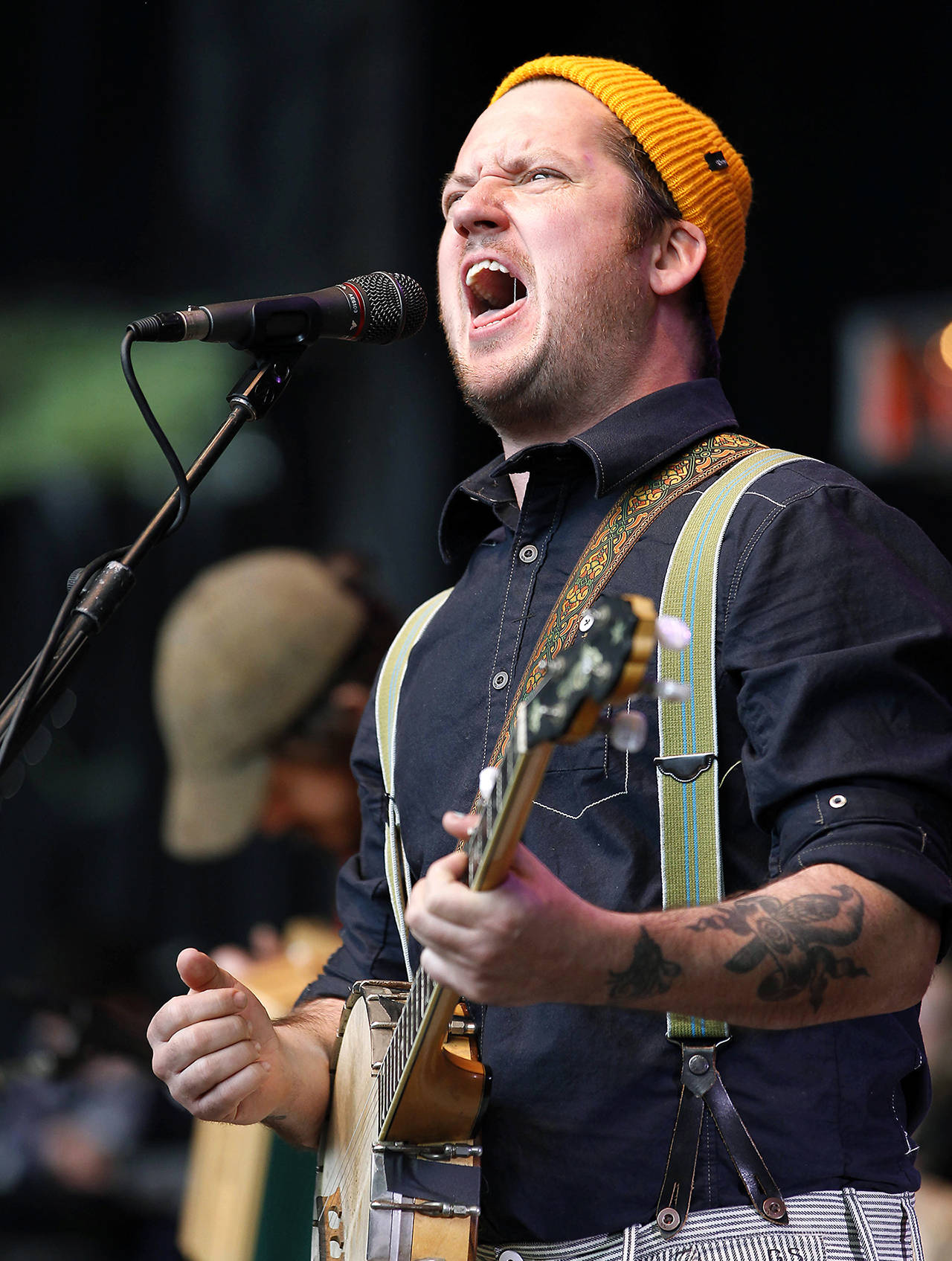 In this 2010 photo, Isaac Brock, lead singer for Modest Mouse, performs during the Bridge School Benefit concert in Mountain View, California. Brock is being sued for nearly $1 million following an August 2016 traffic accident. (AP Photo/Tony Avelar, File)