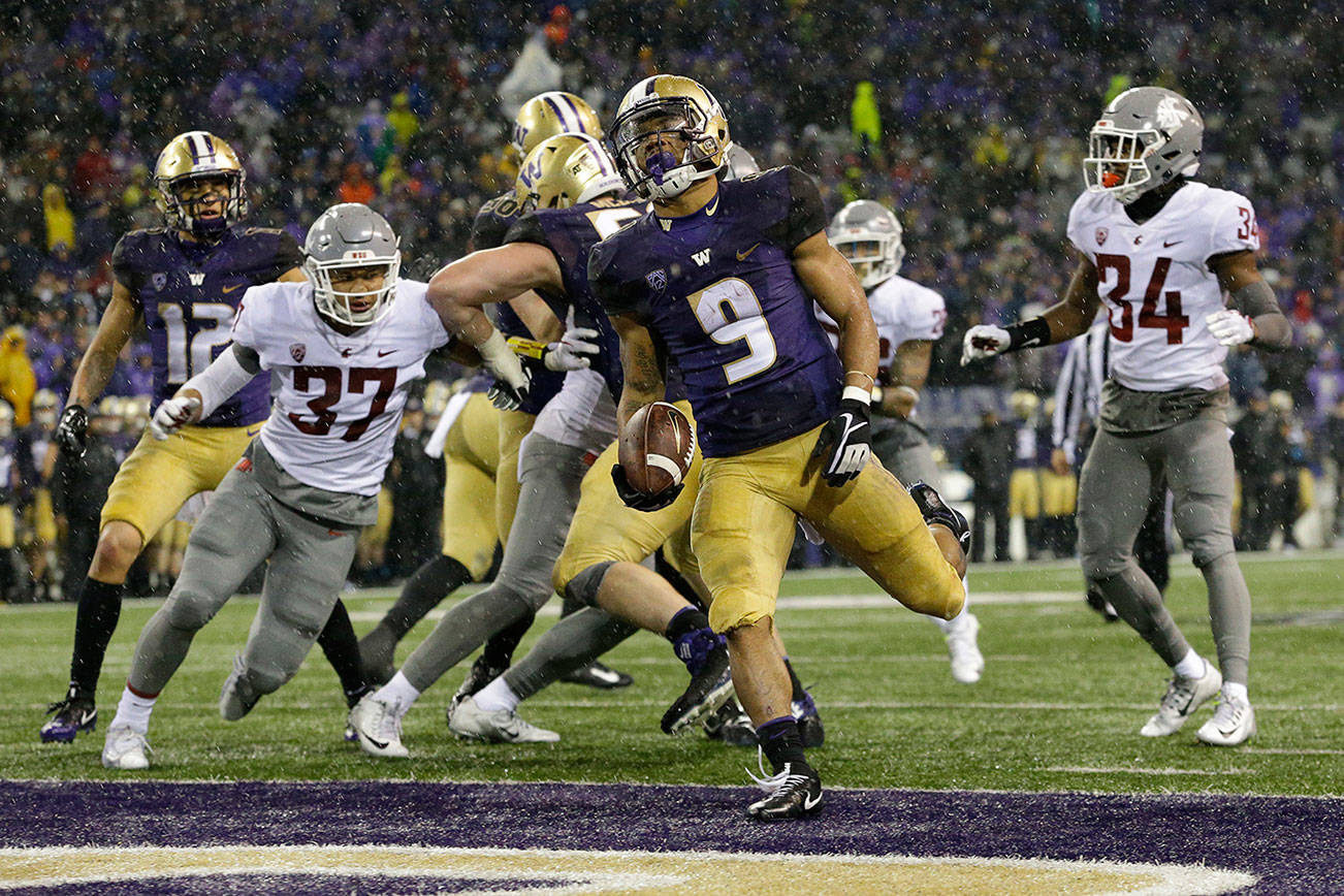 Huskies look to new play-callers in Fiesta Bowl
