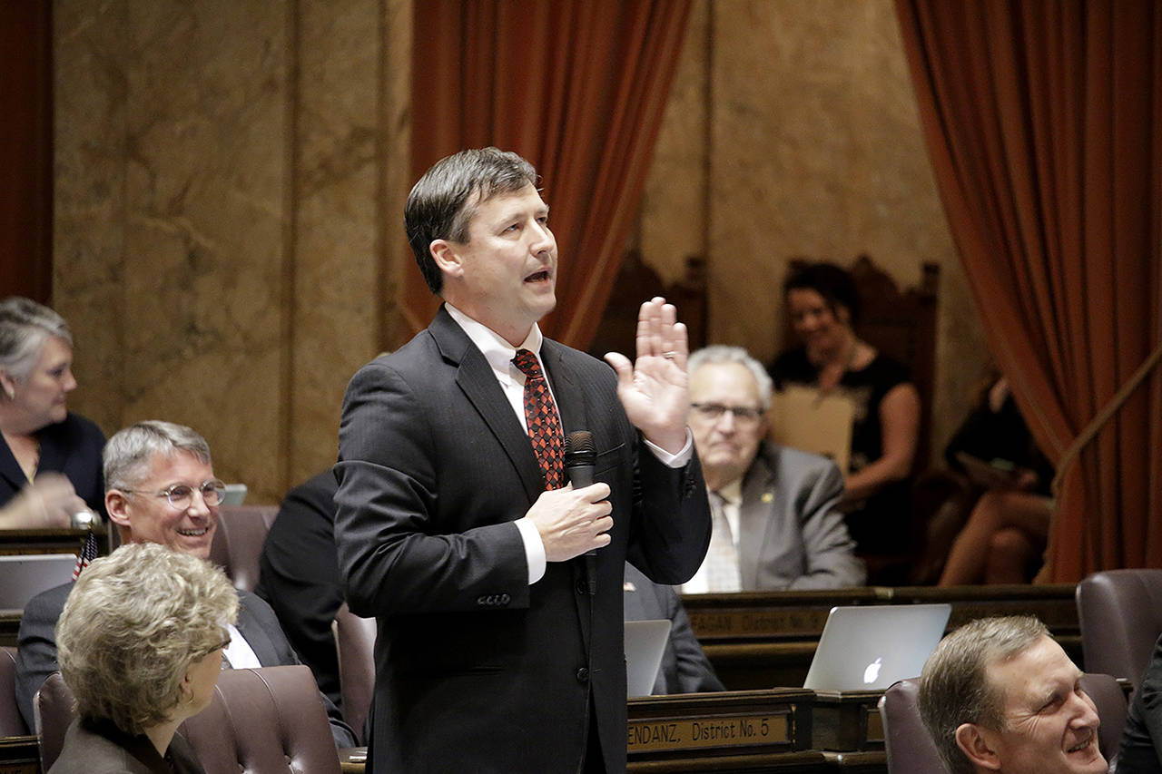 In this March 2015 photo, Rep. Matt Manweller, R-Ellensburg, speaks on the House floor in Olympia. (AP Photo/Rachel La Corte, File)