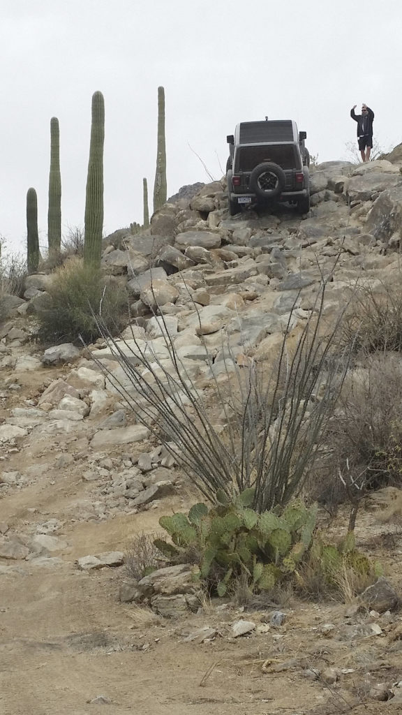 Off-road purists needn’t worry that Jeep has lost the faith by making Wrangler more civilized for 2018, as evidenced by its ability to tackle this boulder incline. (Mary Lowry)
