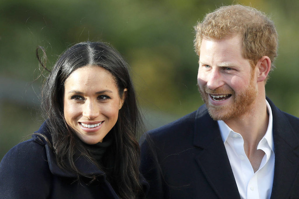 In this Dec. 1 photo, Britain’s Prince Harry and his fiancee, Meghan Markle, arrive at Nottingham Academy in Nottingham, England. (AP Photo/Frank Augstein, File)
