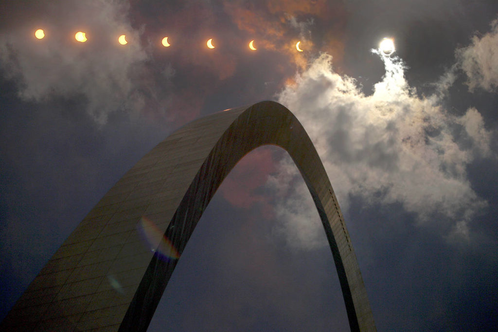 In this Aug. 21 multiple-exposure photograph, the phases of a partial solar eclipse are seen over the Gateway Arch in St. Louis. (AP Photo/Jeff Roberson File)
