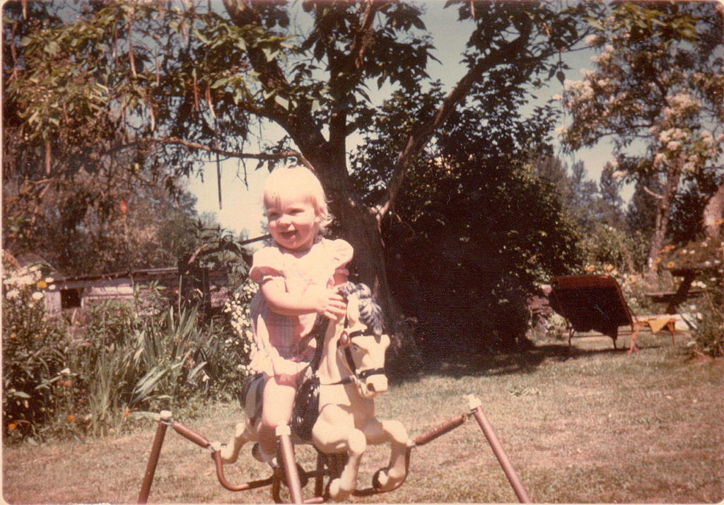 As a little girl on her grandparents’ farm in Grants Pass, Oregon, Crystal Okeson rode miles on her beloved rocking horse. (family photo)
