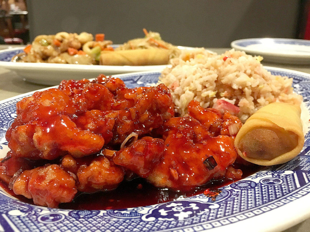 A $7.95 lunch special at Tang Wong in Everett that includes General Tao’s chicken, a fried egg roll, pork fried rice and a cup of egg flower soup. The common offerings landed well, with the chicken balanced between sweet and spicy. (Ben Watanabe / The Herald)
