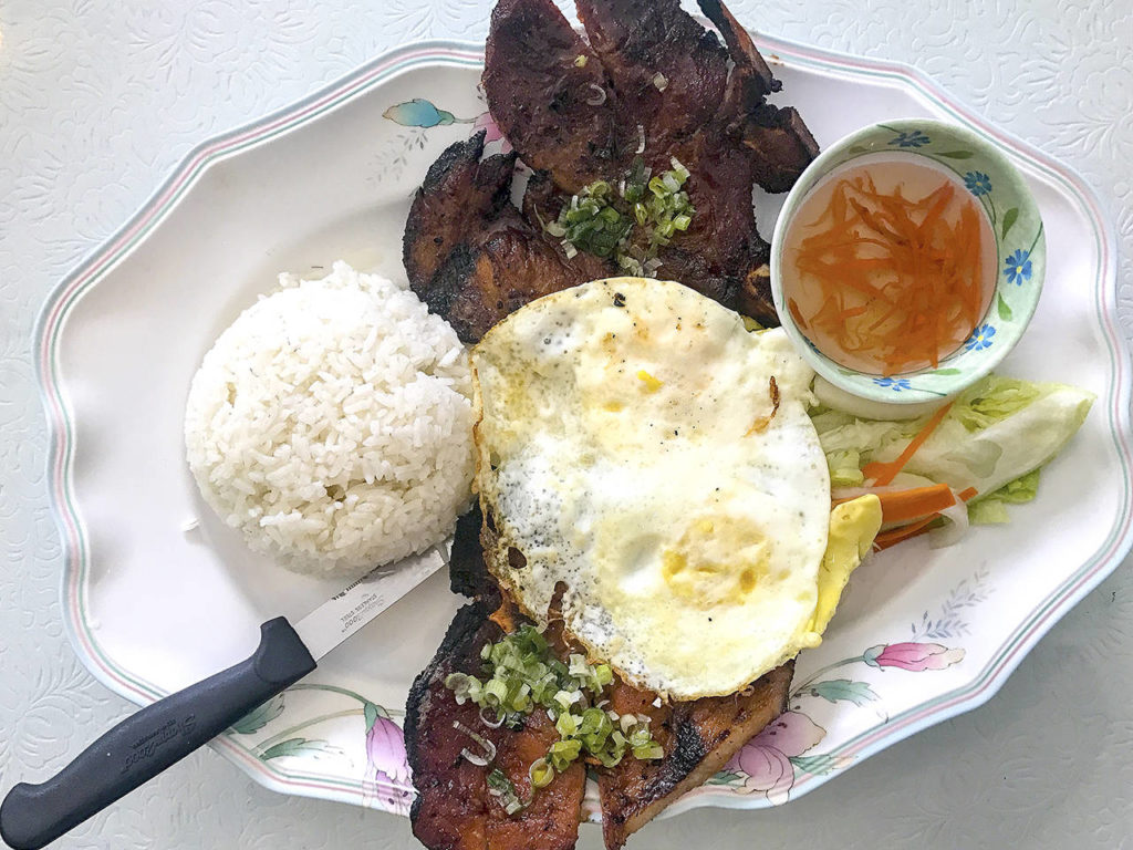 A fried egg is a tasty option to add to meat dishes at Pho Han Vietnamese Restaurant in Lynnwood. (Andrea Brown / The Herald)
