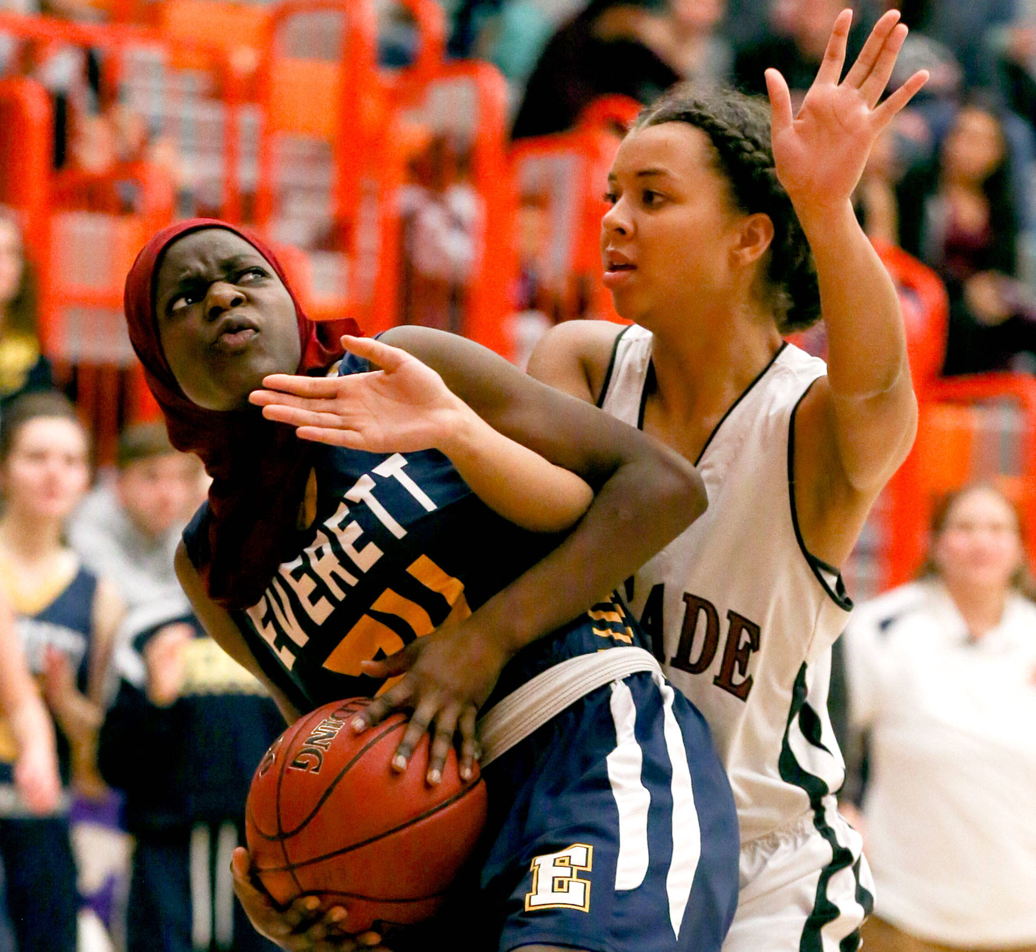 Everett’s Amina Hussein looks for her shot as Cascade’s Malia Jones defends during the girls’ varsity game at Bru-Gull Fest on Friday at Everett Community College. Hussein and the Seagulls won 50-23. (Kevin Clark / The Herald)