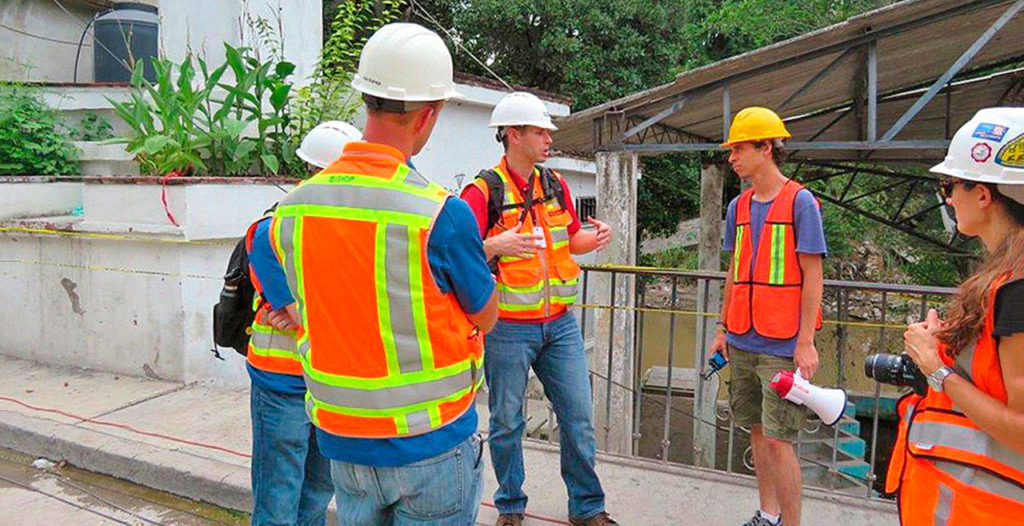 Reid Middleton engineers Kenny O’Neill (center left) and Darin Aveyard (center right) talk while Erik Bishop and Oregon State University professor Erica Fisher look on in Jojutla, a city southwest of Mexico City. A fifth person is unidentified.

