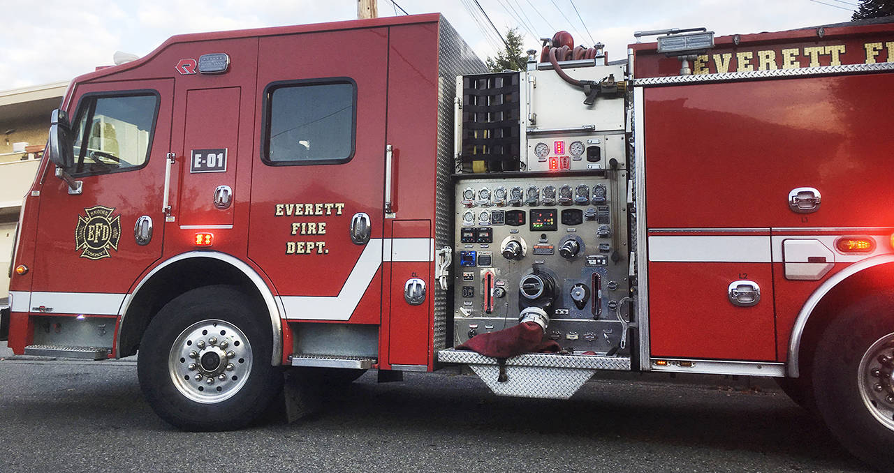 In Everett, the top overtime earner drives a fire engine and has been paid more than $62,000 for extra hours. (Sue Misao / Herald file)