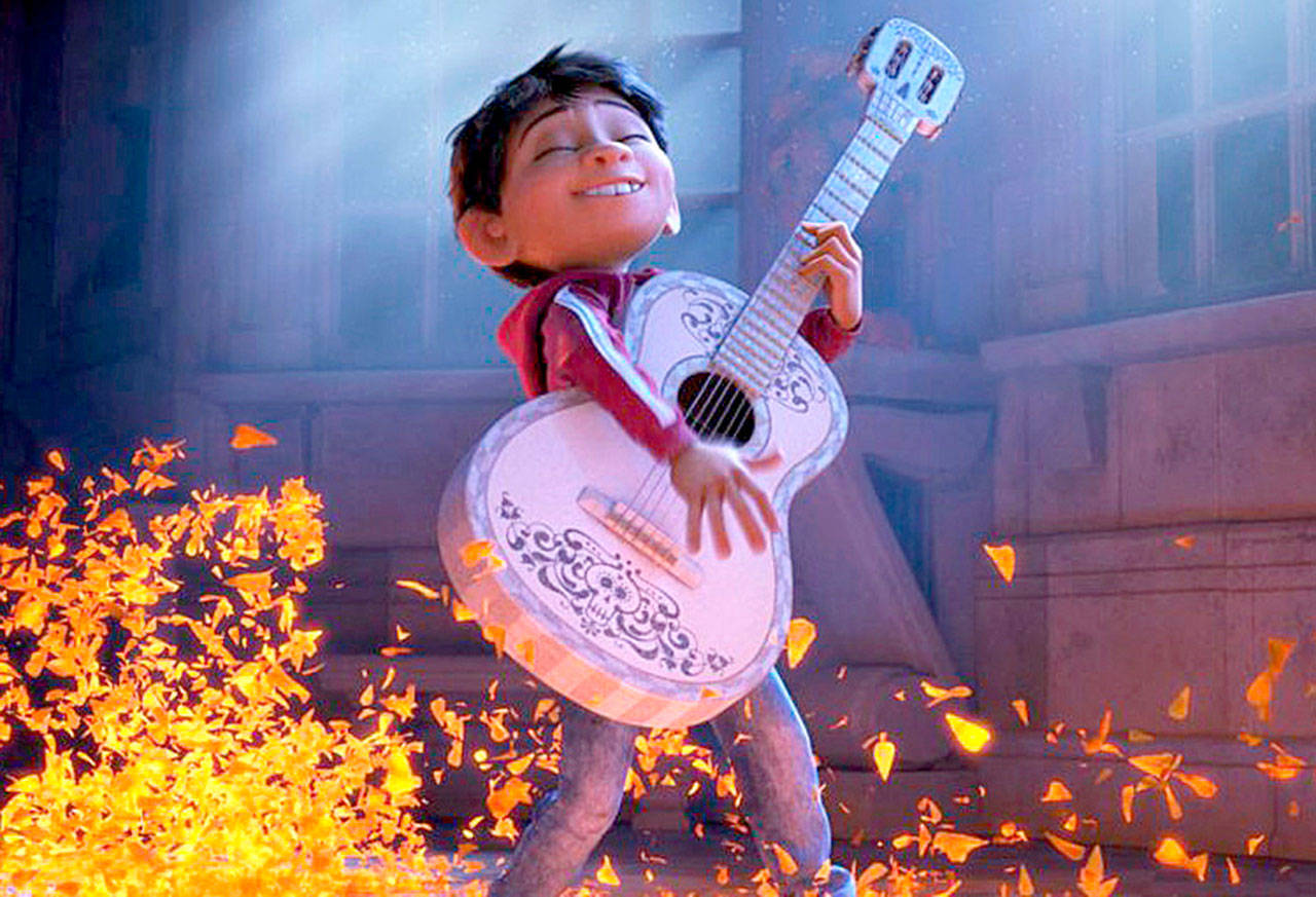 Miguel (voiced by Anthony Gonzalez) has a dream to make music, in Pixar’s new “Coco.” (Disney-Pixar)