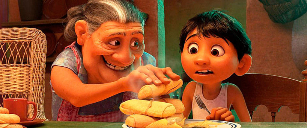 In Disney-Pixar’s “Coco,” Abuelita (Renée Victor) serves Miguel (Anthony Gonzalez) what’s piping hot. (Walt Disney Pictures-Pixar Animation Studios)

