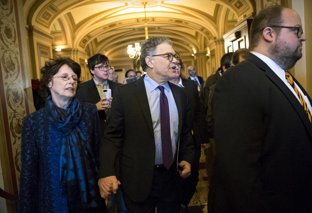 Sen. Al Franken, D-Minn., and his wife, Franni, arrive at the Senate to make a statement on charges of sexual misconduct, on Capitol Hill in Washington, on Thursday. (AP Photo/J. Scott Applewhite)
