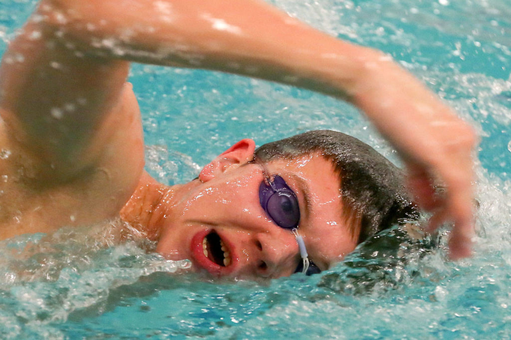 Kevin Clark / The Herald
Lake Stevens’ Carter Walles swims freestyle practice laps during a Vikings’ team practice Monday at Lake Stevens High School. Walles placed third in the 500 freestyle at the 4A state championships last season.
