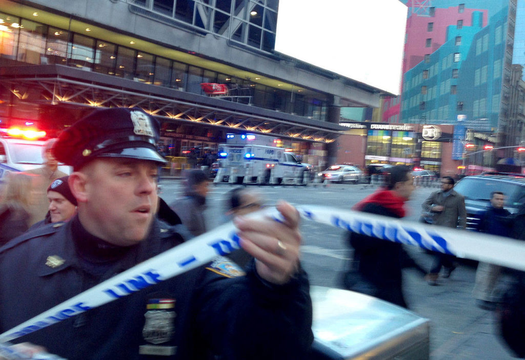Police respond to a report of an explosion near Times Square on Monday in New York. (AP Photo/Charles Zoeller)
