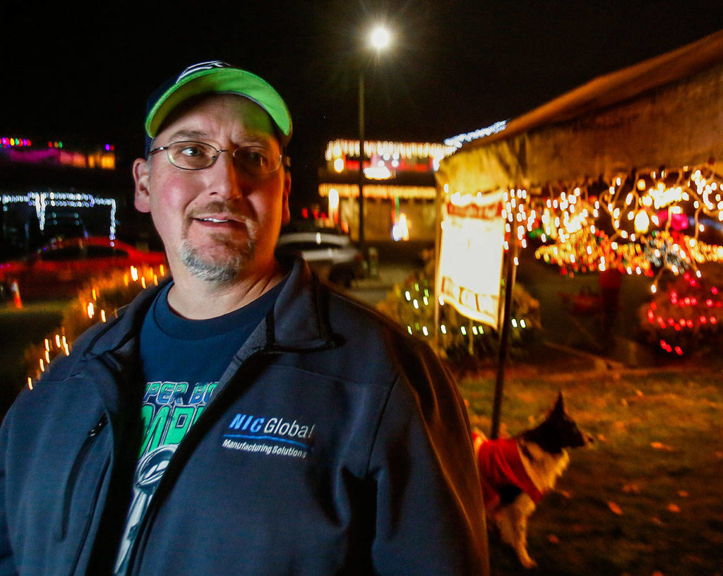 Brandon Crisler moved to Fir grove 18 years ago. He played Santa in years past, but said he is glad that “Paolo likes to do it every day.”
