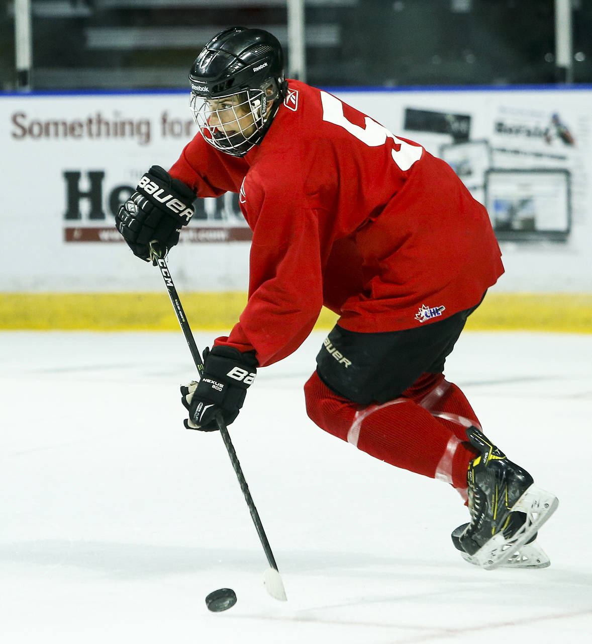 Silvertips prospect Ronan Seeley handles the puck during the second day of Everett’s training camp on Aug. 25, 2017, at Xfinity Arena. The Silvertips signed Seeley to a WHL standard player agreement on Tuesday. (Ian Terry / The Herald)