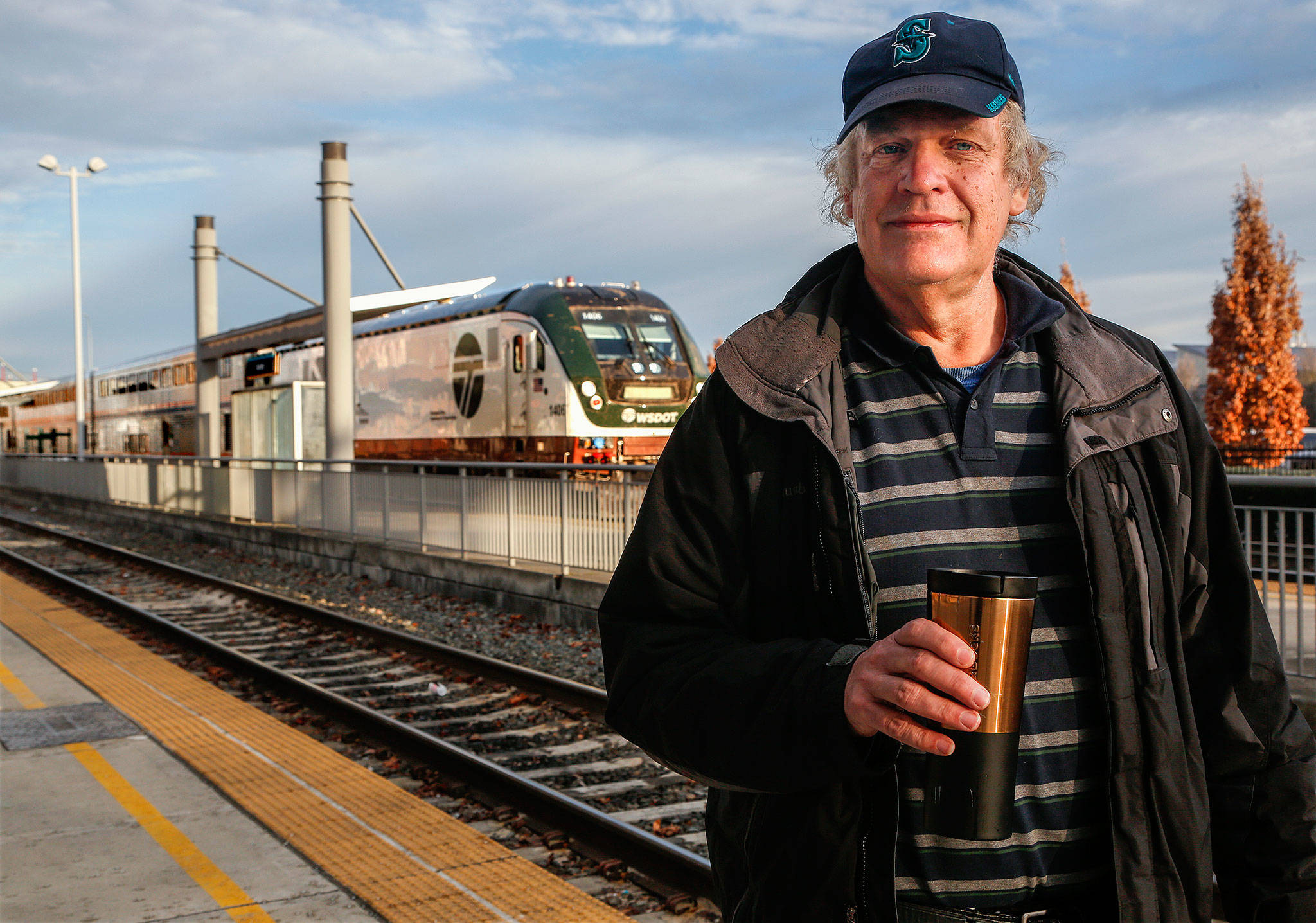 Longtime train buff Mark Garcia, of Everett lost two friends who were fellow rail enthusiasts in Monday’s Amtrak derailment south of Tacoma. Those friends, Jim Hamre and Zack Willhoite, had often taken train trips with Garcia, shown here Thursday as an Amtrak train leaves Everett Station for Vancouver, B.C. (Dan Bates / The Herald)