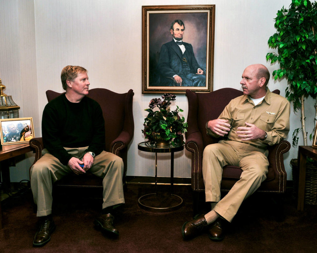 Ray Stephanson, mayor of USS Abraham Lincoln’s home port of Everett, speaks with Rear Adm. Scott Swift, Commander Carrier Strike Group (CSG) 9, in the Commanding Officer’s inport cabin during a visit to USS Abraham Lincoln (CVN 72). The Lincoln was under way on a scheduled work-up conducting sustainment training and carrier qualifications. (U.S. Navy photo by Mass Communication Specialist 2nd Class James R. Evans/ file)
