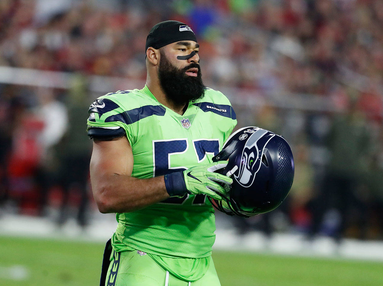 Seahawks outside linebacker Michael Wilhoite (57) stands on the field during a game against the Cardinals on Nov. 9, 2017, in Glendale, Ariz. (AP Photo/Rick Scuteri)