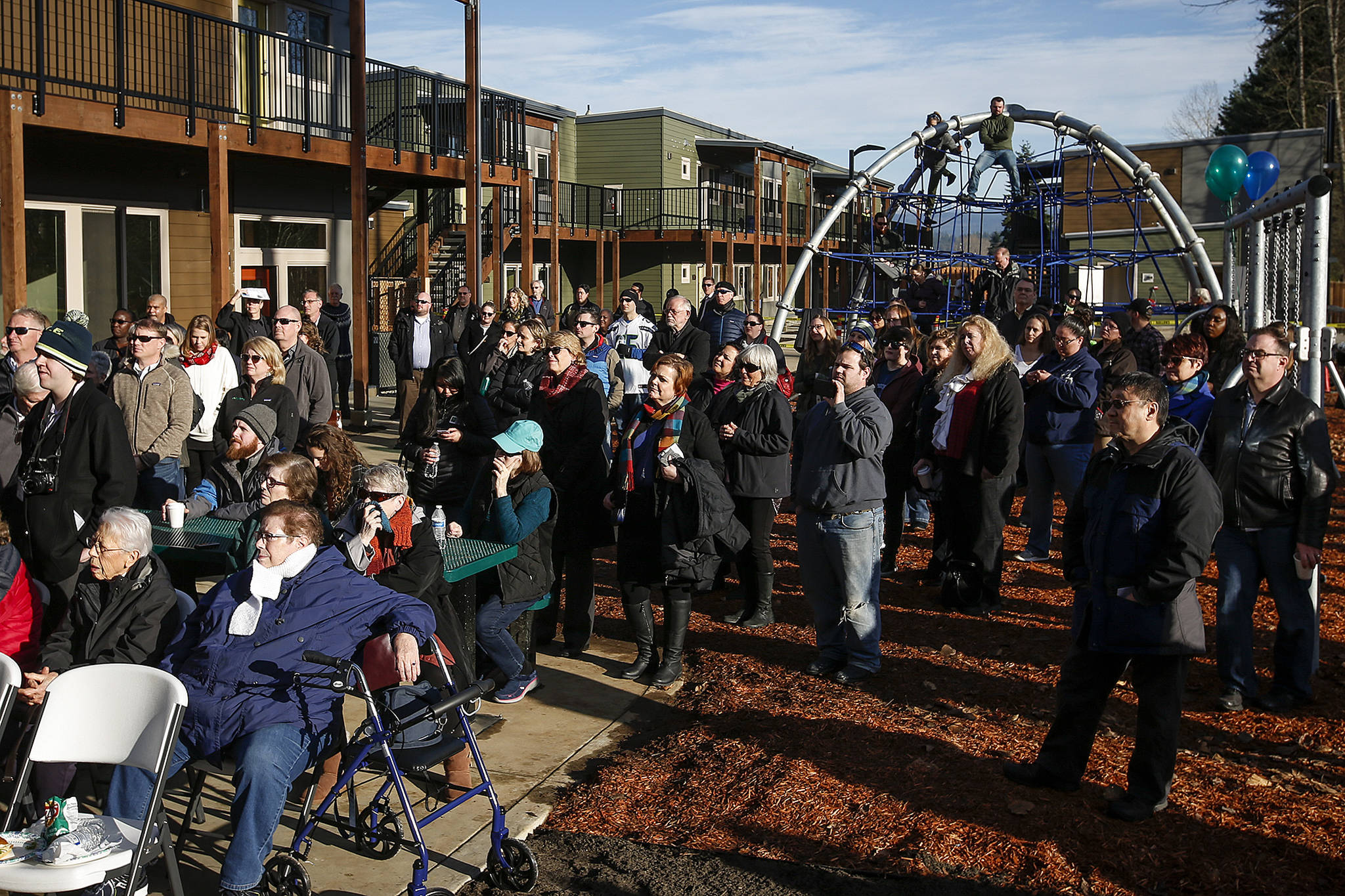 The playground area of Housing Hope’s new Twin Lakes Landing housing project is seen during a public gathering to celebrate its opening on Friday, Dec. 8. (Ian Terry / The Herald)