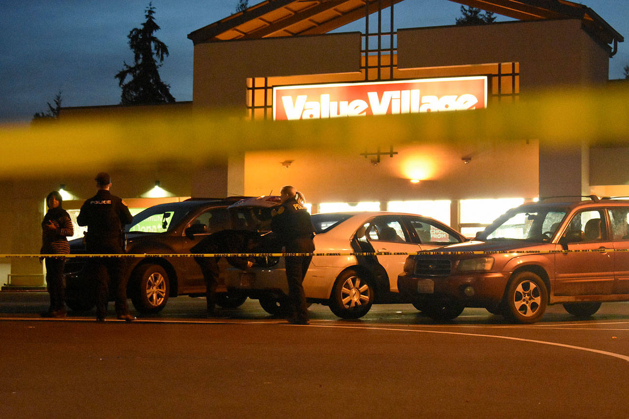 Everett police responded to a report of shots fired Thursday afternoon at Value Village on Evergreen Way. (Caleb Hutton / The Herald)