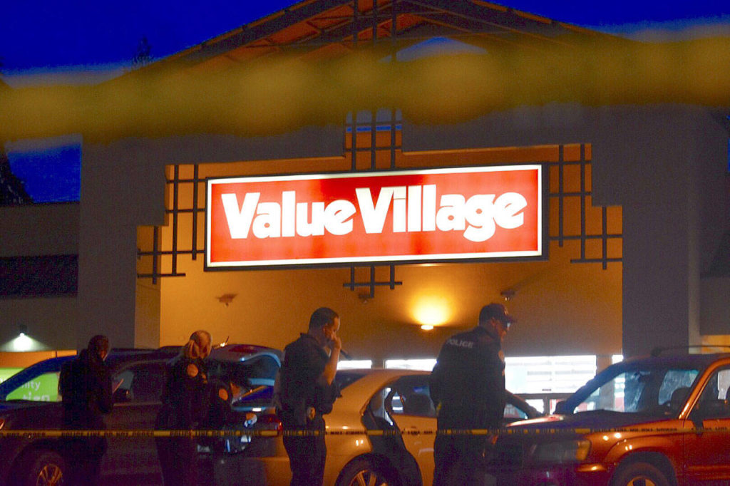 Everett police responded to a report of shots fired Thursday afternoon at Value Village on Evergreen Way. (Caleb Hutton / The Herald)
