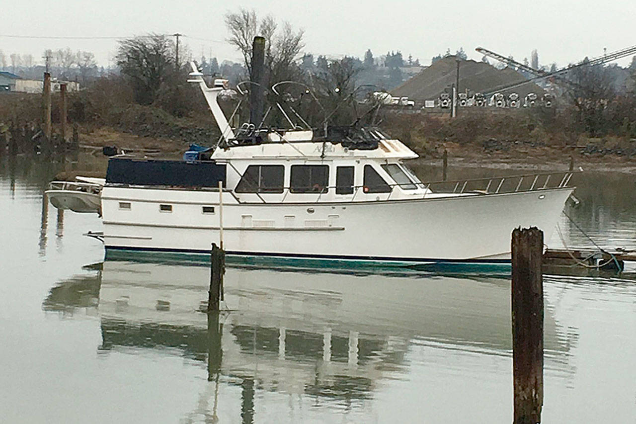 A boat caught fire Saturday morning at a private marina on Union Slough in Everett. The Everett Fire Department said in a Tweet that bystanders used extinguishers and a garden hose to battle the flames before firefighters arrived. (Everett Fire Department)