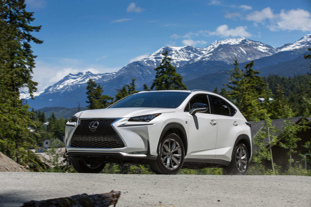 The five-passenger Lexus NX 200t F Sport compact luxury SUV has a distinct black mess grille and metallic bumper molding. (Manufacturer photo)
