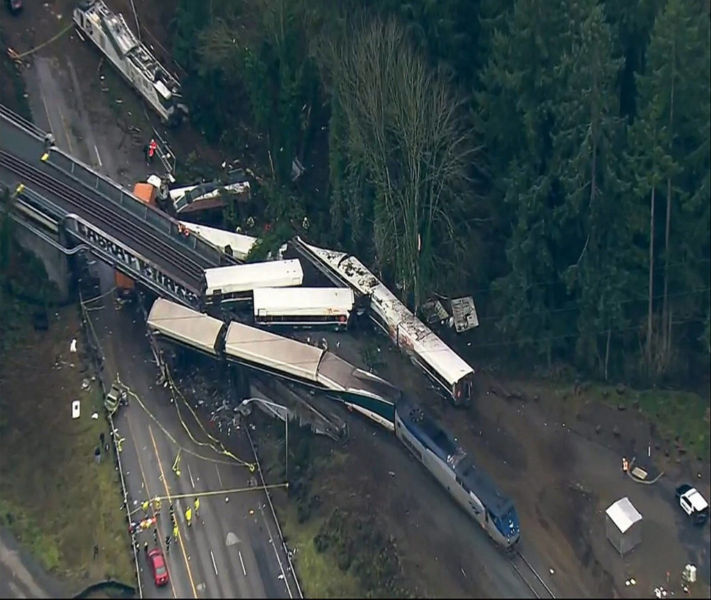 This aerial image shows the site of an Amtrak train that derailed south of Tacoma on Monday. (KOMO-TV via AP)
