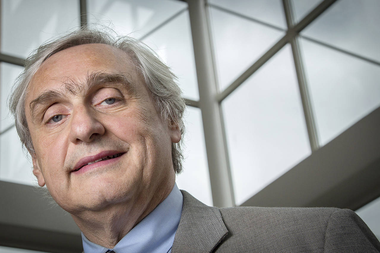 In this 2014 photo, then-Chief Judge of the U.S. Court of Appeals for the Ninth Circuit Alex Kozinski poses for a portrait in the lobby of a Washington office building. (AP Photo/J. David Ake, File)
