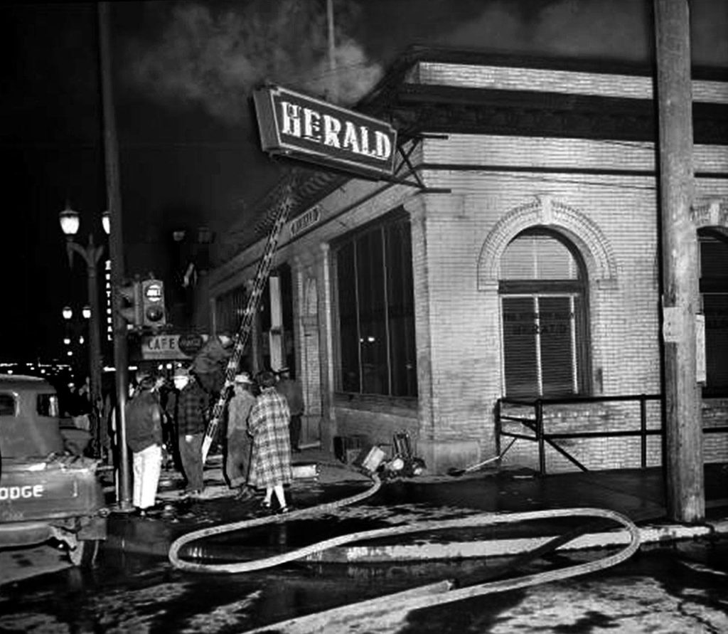 The Everett Daily Herald, shown here when its building caught fire in 1956, was once located at 2939 Colby Ave. The Everett Museum of History purchased the building this week. (Jim Leo / Herald file)
