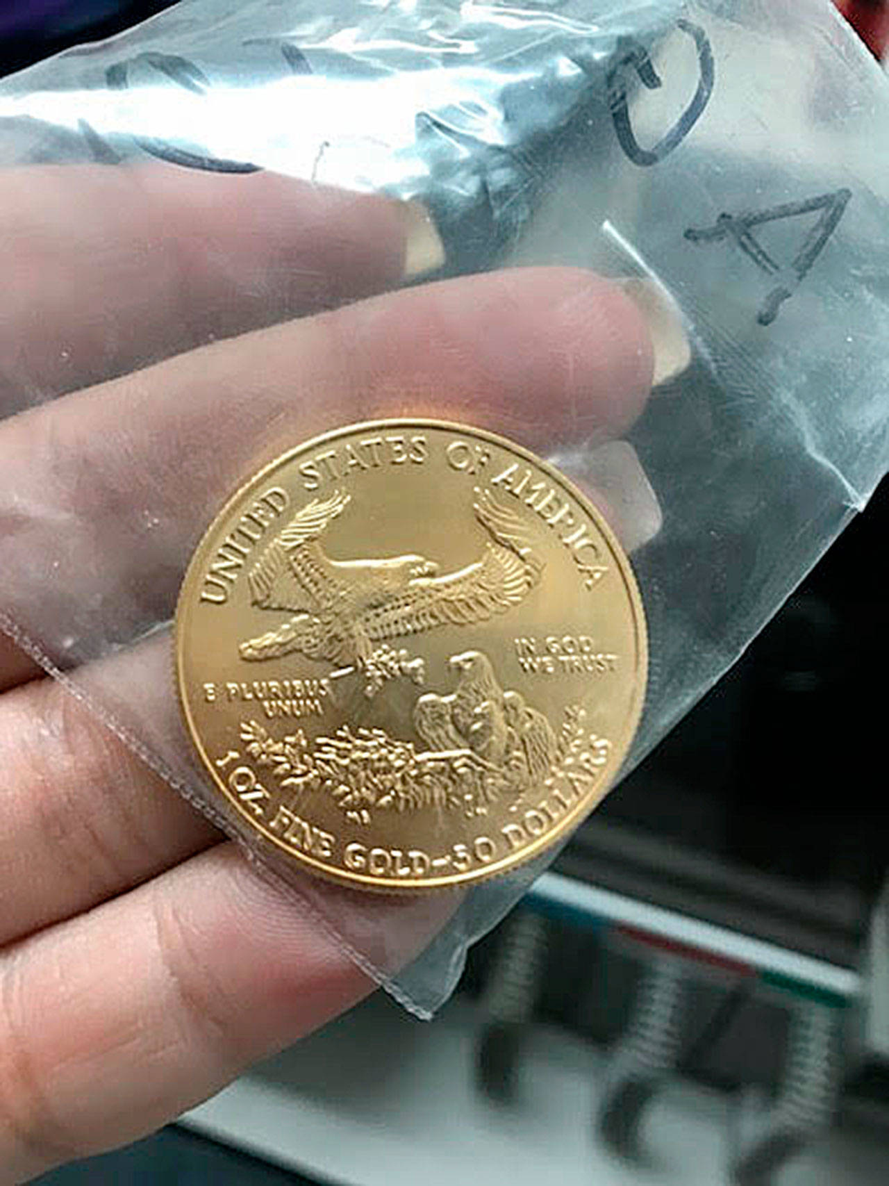 An unemployed construction worker was on duty when someone dropped this rare gold coin into a Salvation Army kettle Tuesday in Lynnwood.