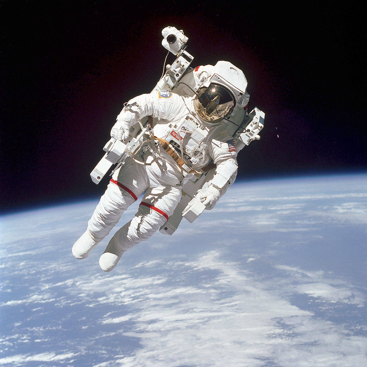 Astronaut Bruce McCandless takes part in an untethered spacewalk, using a nitrogen-propelled Manned Maneuvering Unit on Feb. 7, 1984. (NASA)