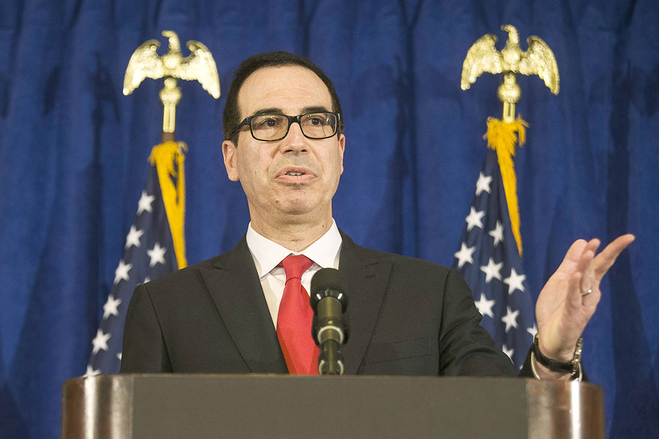 In this Sept. 21 photo, Treasury Secretary Steve Mnuchin speaks at a news briefing at the Hilton Midtown hotel during the United Nations General Assembly, in New York. (AP Photo/Andres Kudacki, File)