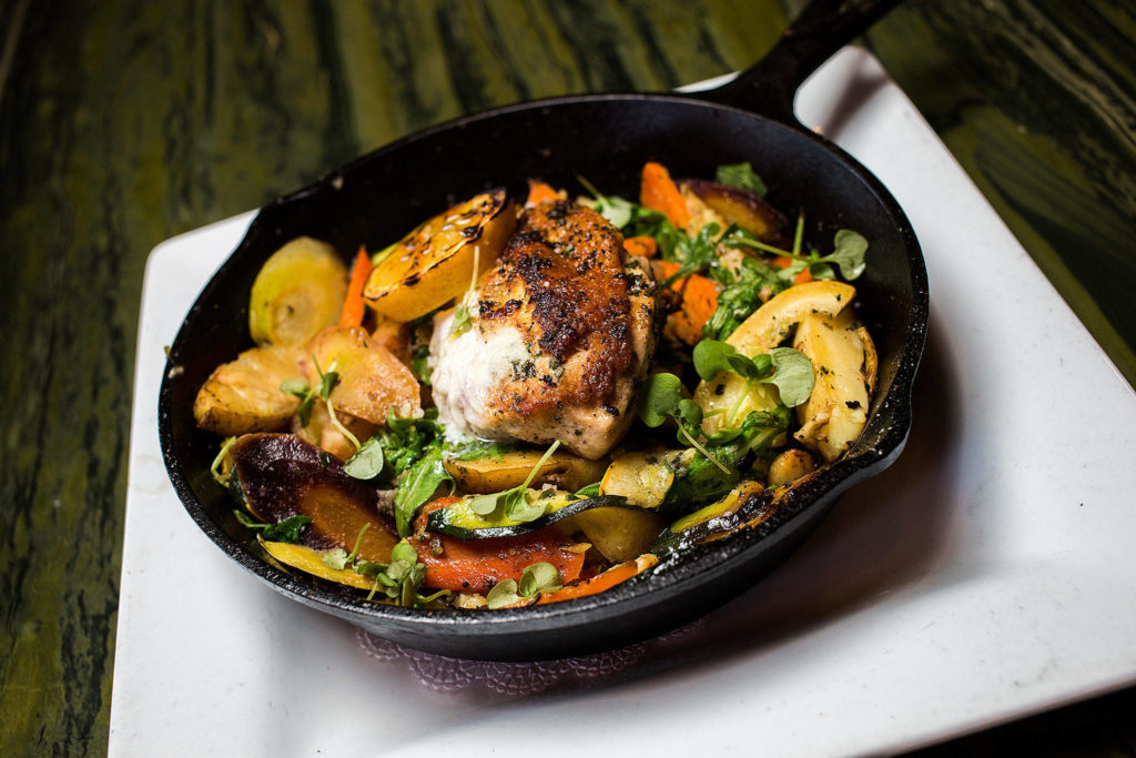 Lombardi’s 40 Clove Chicken is loaded with garlic. (Andy Bronson / The Herald)
