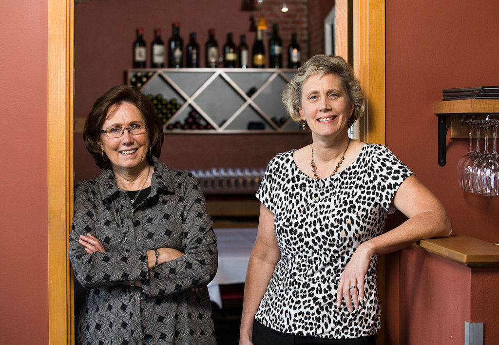 Diane Symms and Kerri Lonergan-Dreke are the mother and daughter co-owners of Lombardi’s restaurants in Everett and Mill Creek. (Andy Bronson / The Herald)
