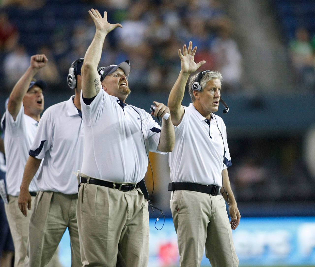 In this Aug. 14, 2010, photo, Seattle Seahawks defensive-line coach Dan Quinn (left) and head coach Pete Carroll gesture during a preseason game against the Tennessee Titans. Quinn is now the head coach of the Atanta Falcons. (AP Photo/John Froschauer, File)