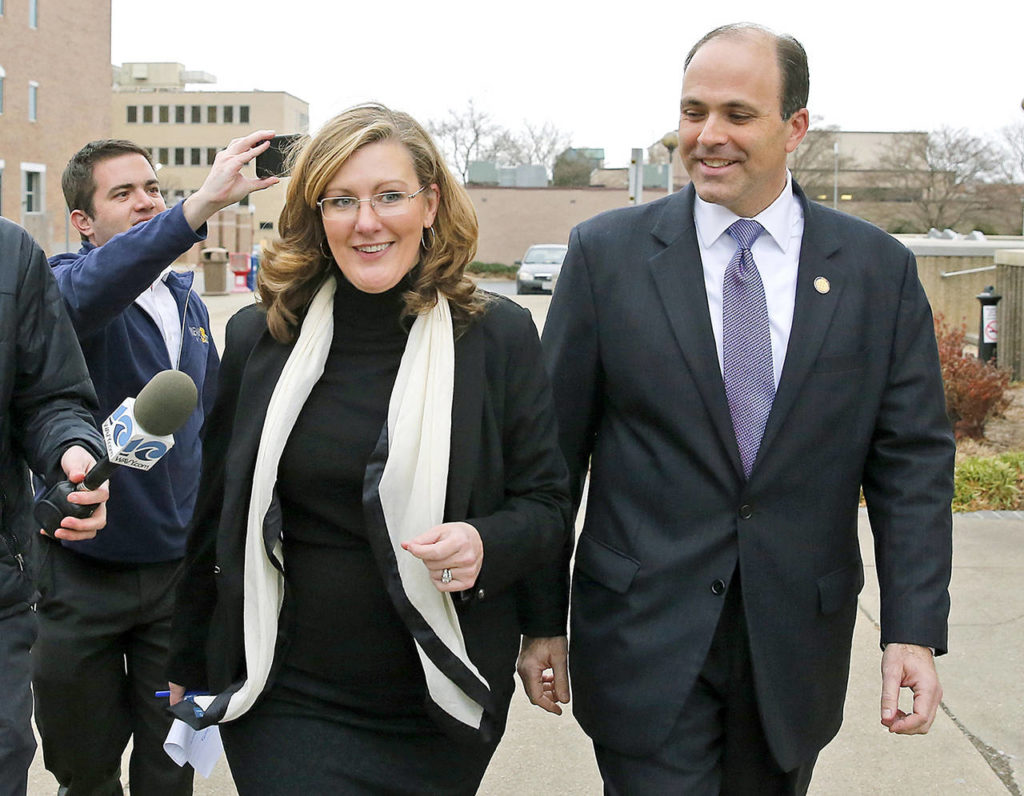 In this Dec. 20 photo, Republican incumbent state Del. David Yancey walks with campaign manager Gretchen Heal outside the Newport News Courthouse in Newport News, Virginia. (Jonathon Gruenke/The Daily Press via AP, File)
