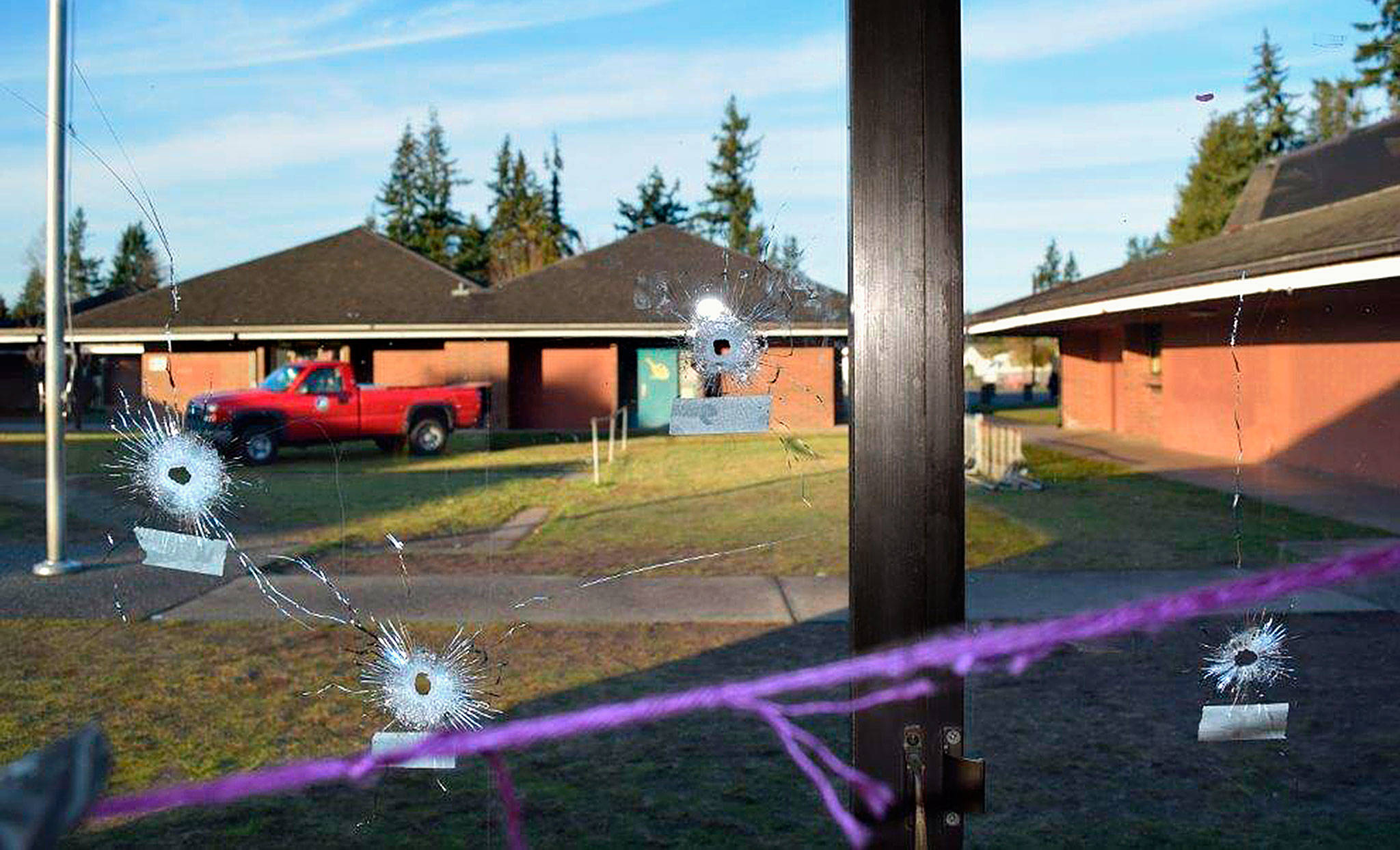 Students returning from winter break found dozens of bullet holes in the windows of Marysville’s Pinewood Elementary School. (Marysville Police Department)