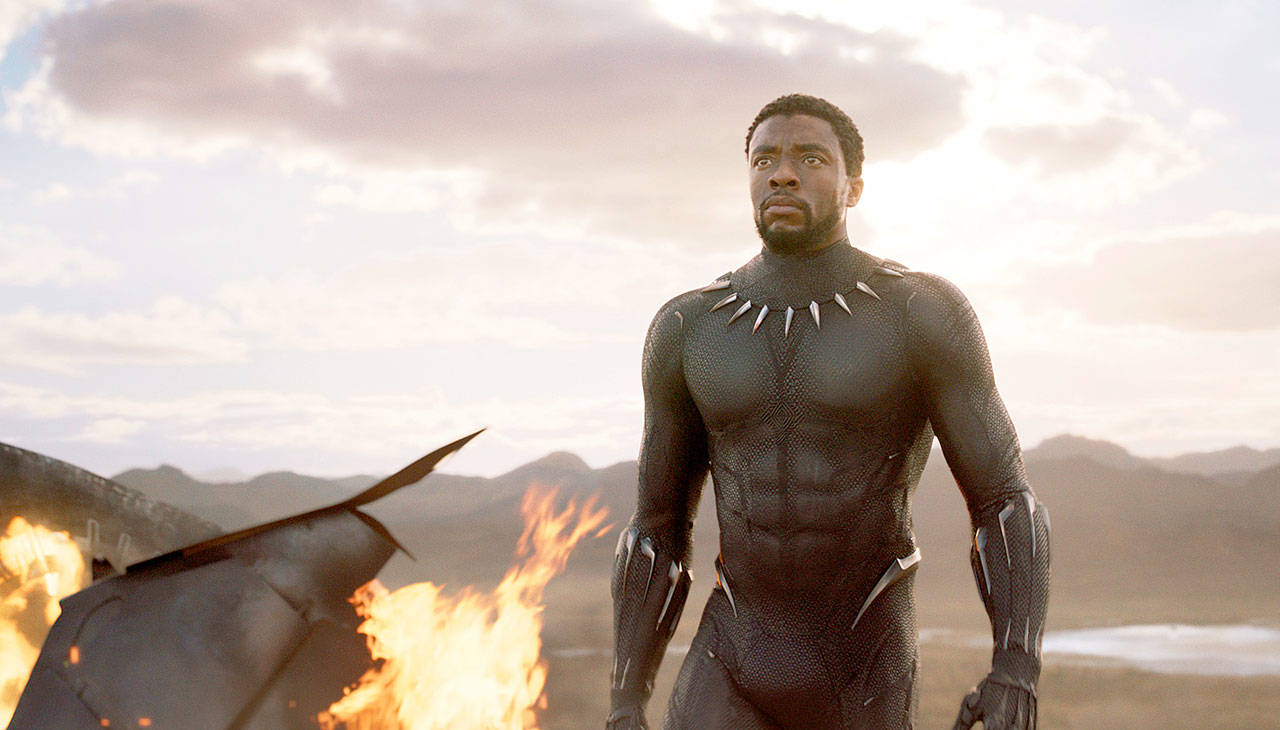 This image released by Disney and Marvel Studios’ shows Chadwick Boseman in a scene from “Black Panther,” in theaters Feb. 16. (Marvel Studios/Disney via AP)