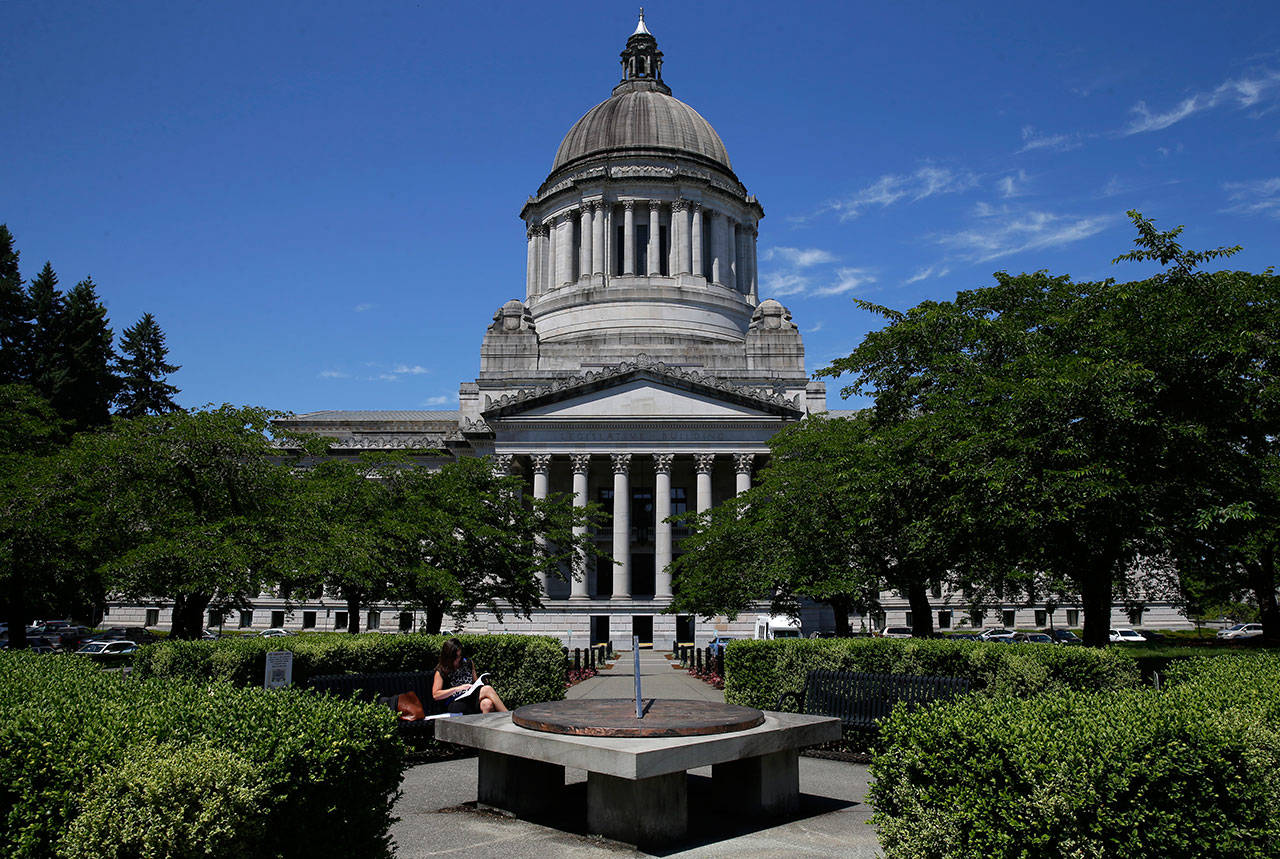 The Washington Legislature’s short, 60-day session begins Monday at the Legislative Building at the Capitol in Olympia. (Ted S. Warren / Associated Press file photo)