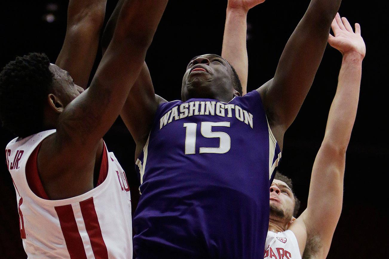 Huskies rally in 2nd half to beat Cougars 70-65