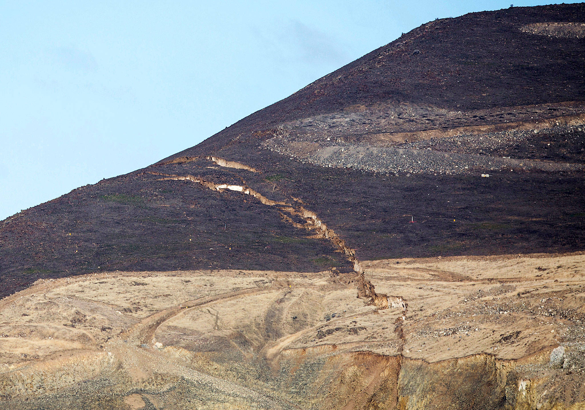 A crack in Rattlesnake Ridge near Union Gap, south of Yakima, has been growing and has prompted evacuations of nearby residents. This is how it looked last Wednesday. (Shawn Gust/Yakima Herald-Republic via AP)