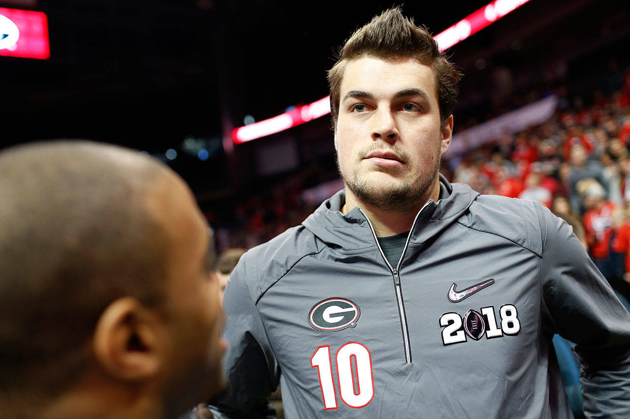 Georgia quarterback Jacob Eason (10) speaks with the media during Georgia’s media day ahead of the NCAA National Championship Game in Atlanta, Saturday, January 6, 2018. (Joshua L. Jones/Athens Banner-Herald via AP)