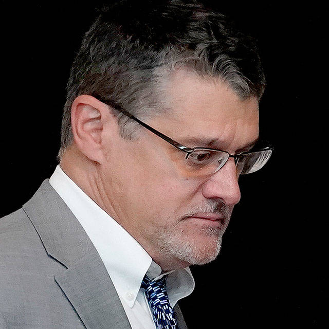 Glenn R. Simpson, former Wall Street Journal reporter and co-founder of the research firm Fusion GPS, arrives for a scheduled appearance before a closed House Intelligence Committee hearing on Capitol Hill in Washington on Nov. 14. (AP Photo/Pablo Martinez Monsivais)