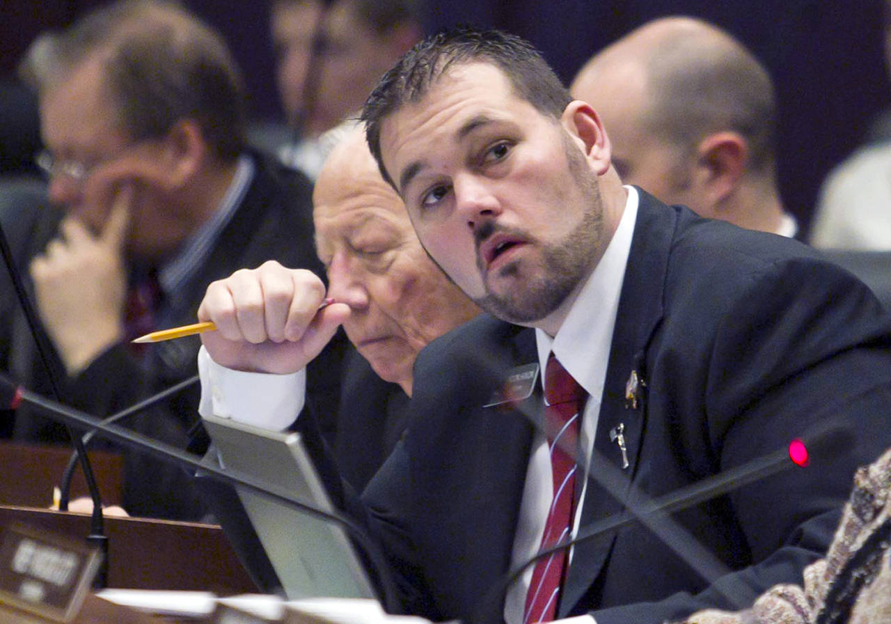 In this 2013 photo, state Rep. Brandon A. Hixon, R-Caldwell, looks on at the statehouse in Boise, Idaho. The former Idaho Republican state lawmaker, who was under investigation for possible sexual abuse, died in an apparent suicide, according to authorities on Tuesday. (Darin Oswald/Idaho Statesman via AP, File)